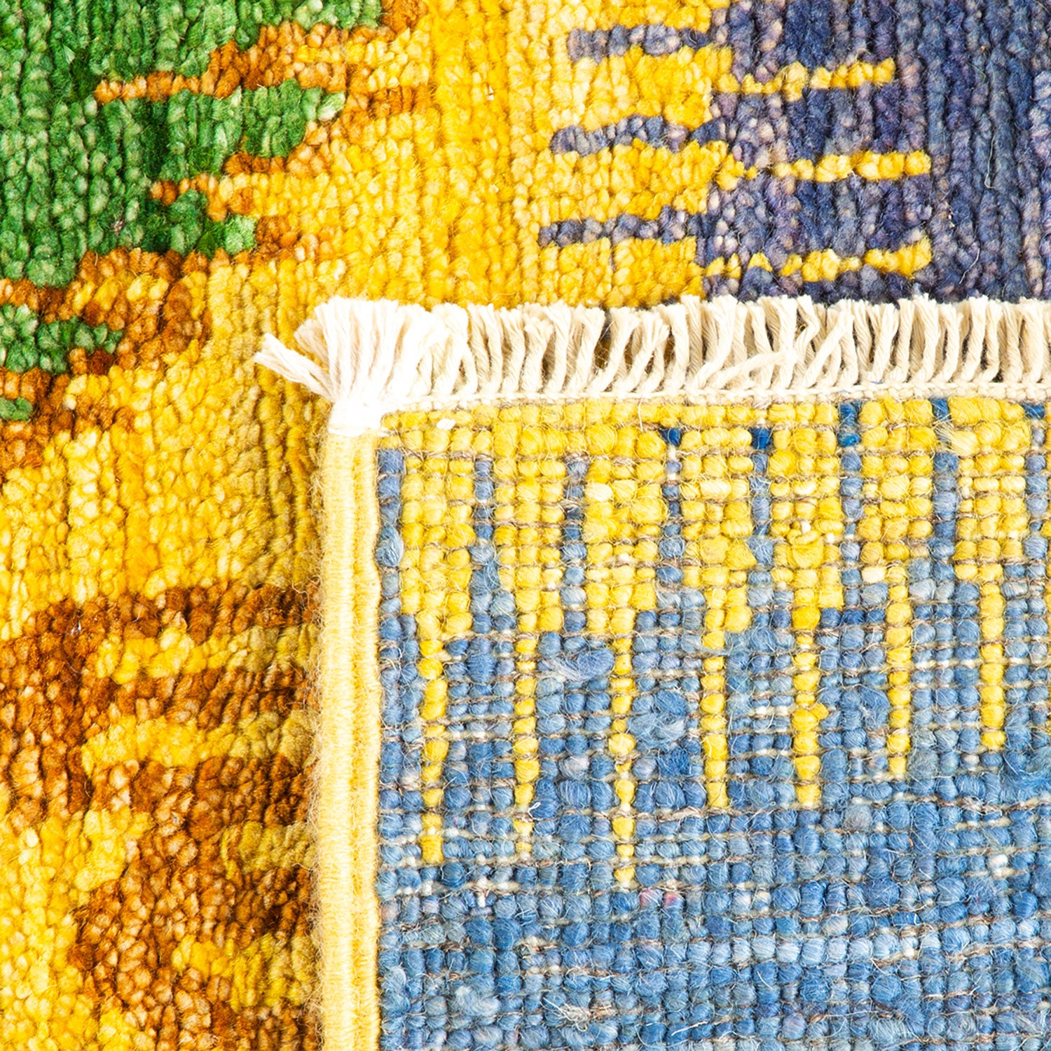 Close-up of a vibrant, handcrafted textile with intricate woven texture.