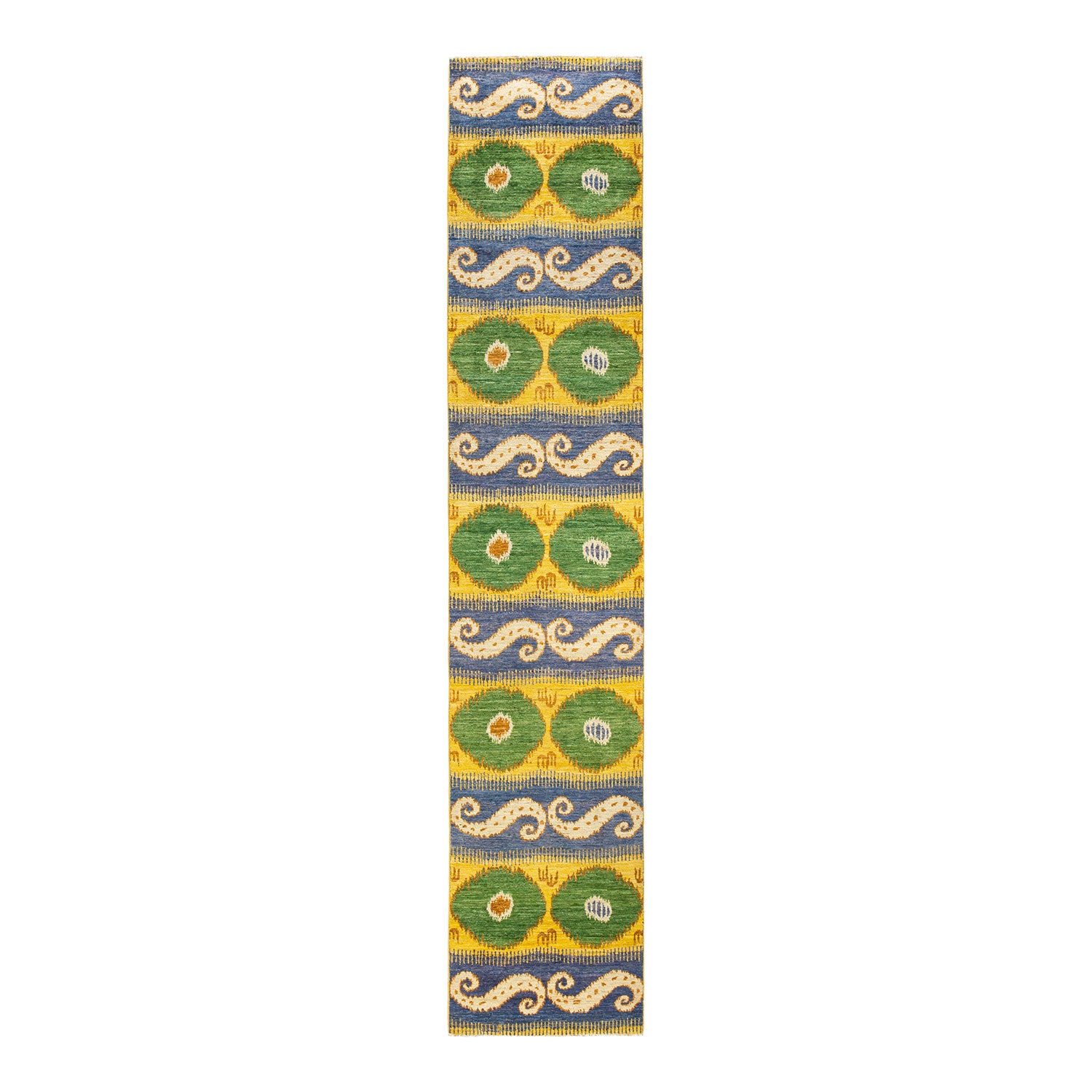 Vibrant textile with stylized motifs in blue, green, and yellow.