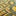 Vibrant carpet with geometric pattern in yellow, orange, green, and blue.