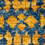 Vibrant gold and blue patterned fabric with soft plush texture.