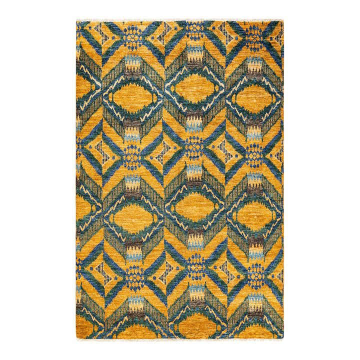 Vibrant tribal-inspired rug with symmetrical geometric pattern in yellow and blue.