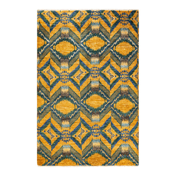 Vibrant tribal-inspired rug with symmetrical geometric pattern in yellow and blue.