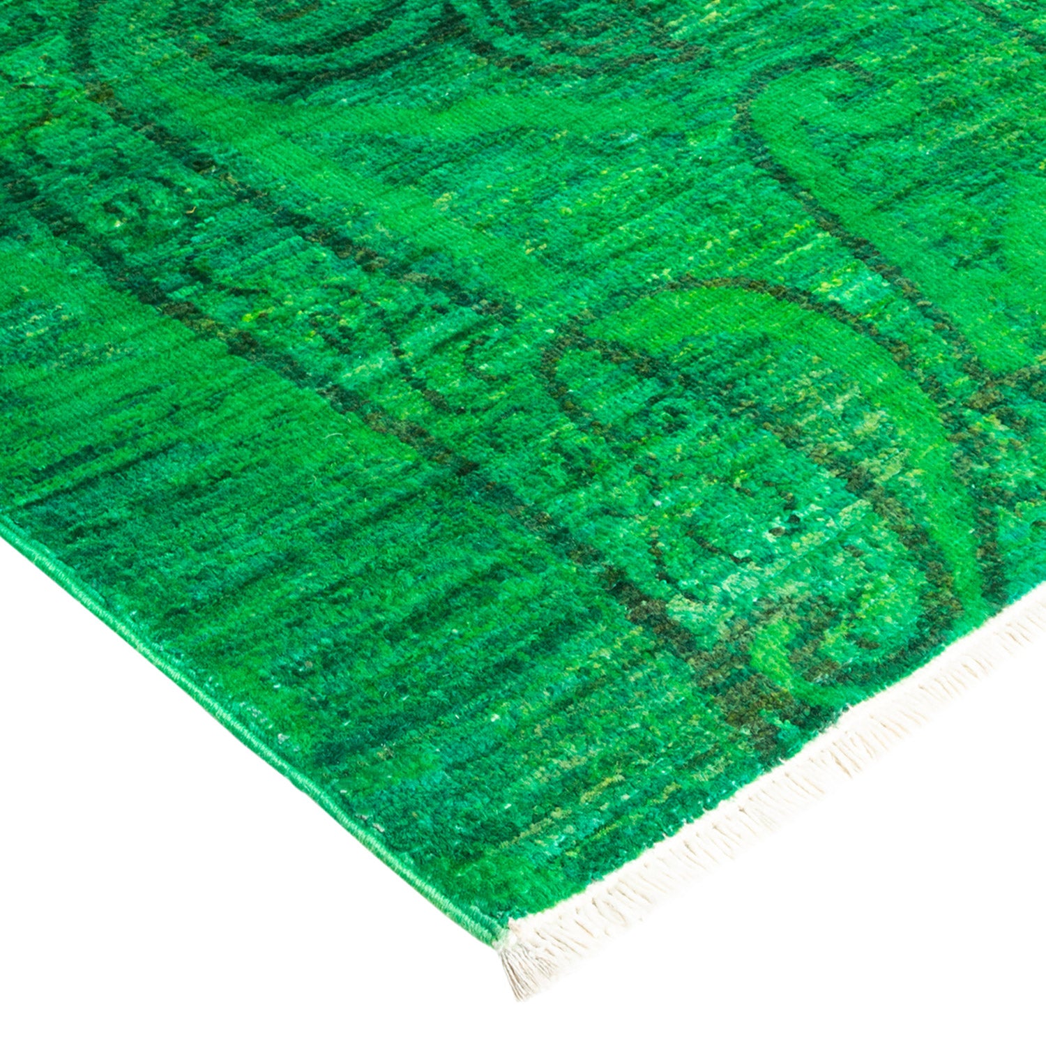 Vibrant green rug with wavy pattern and fringed edge.