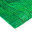 Vibrant green rug with wavy pattern and fringed edge.