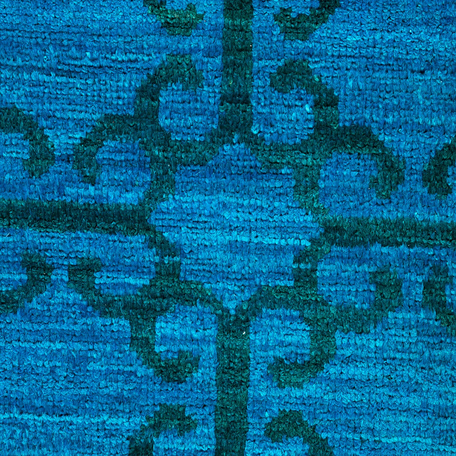 Abstract, textured pattern in shades of blue with geometric shapes
