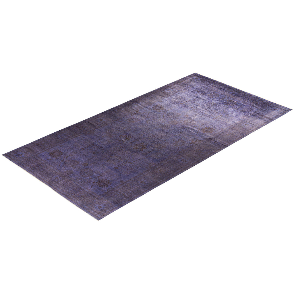 Rectangular vintage rug with blue and indigo shades, textured design.