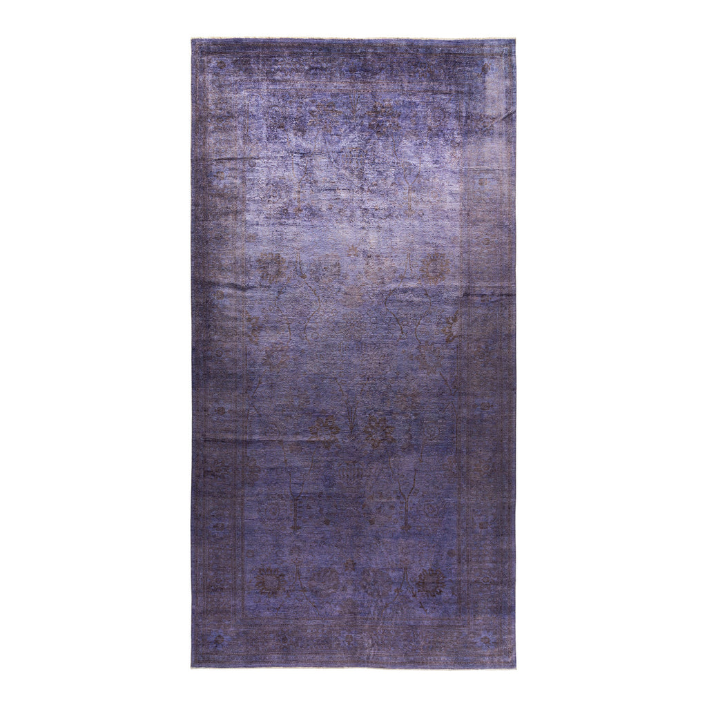 Faded and distressed rectangular rug with vintage Persian design.