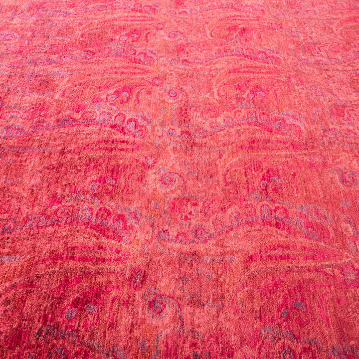Vibrant, textured carpet with curvilinear pattern and thick pile.