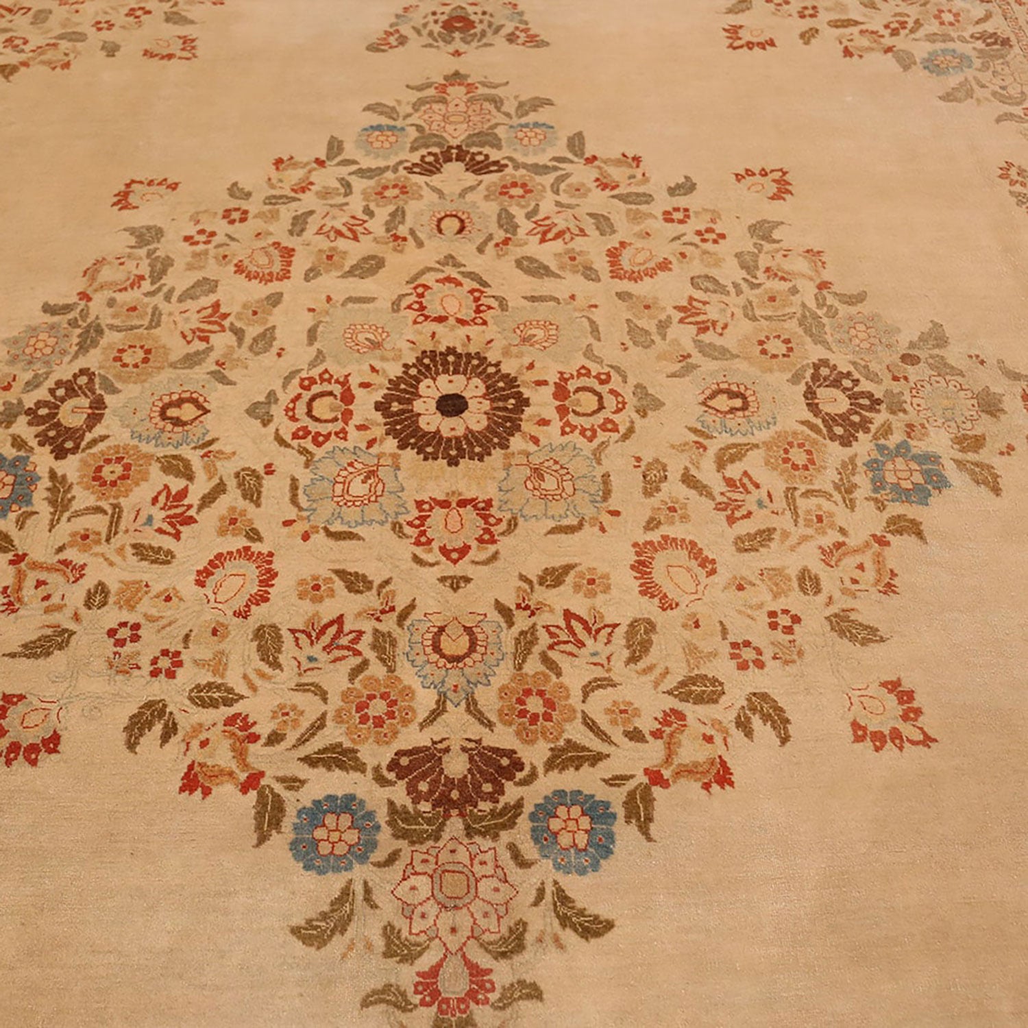Stunning handmade rug with vibrant floral pattern in warm tones.