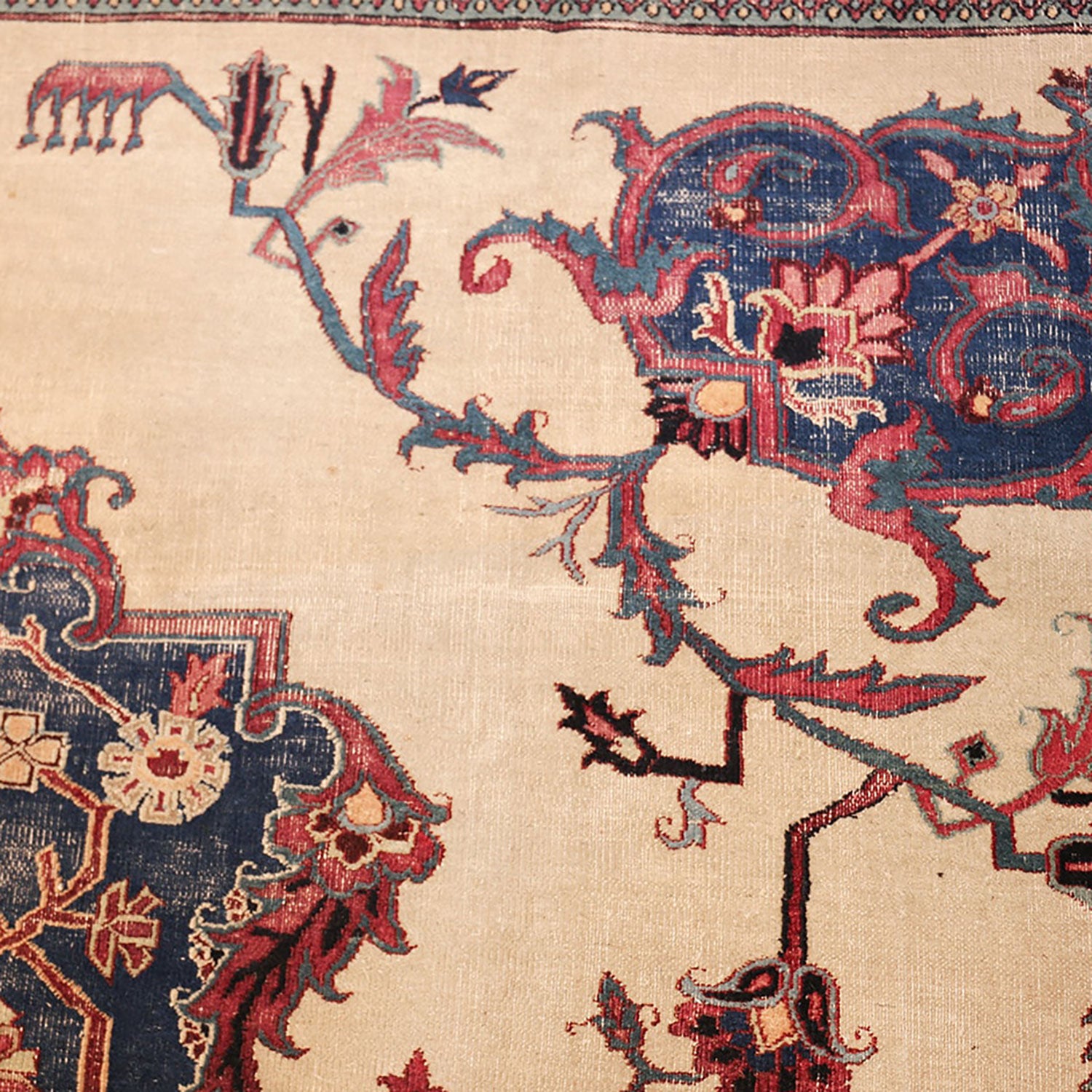 Intricately designed handwoven rug showcases ornate floral motifs and craftsmanship.
