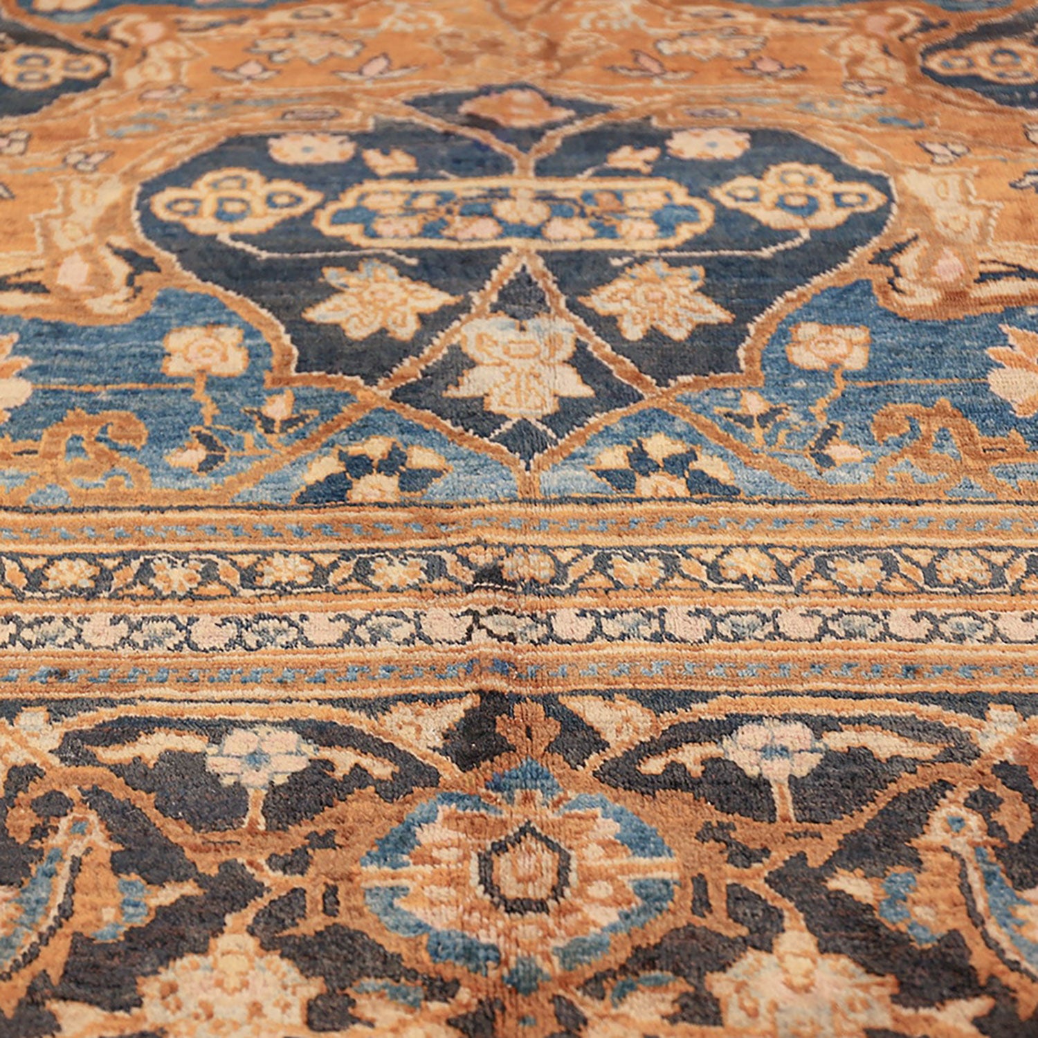 Exquisite handmade rug with intricate geometric and floral motifs