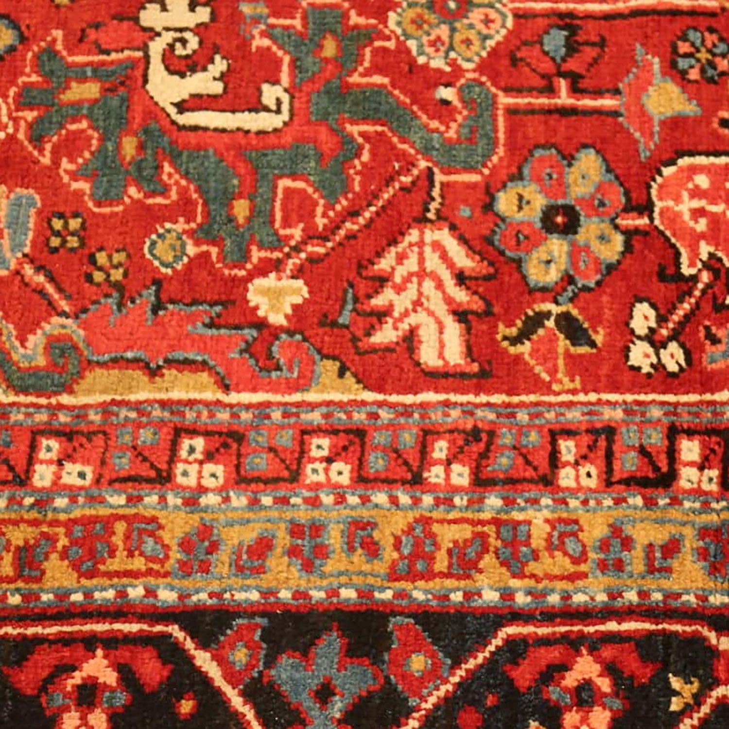 Exquisite handmade carpet showcases intricate design and vibrant color palette.
