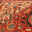 Vibrantly patterned, intricately woven carpet showcases traditional Persian/Oriental design excellence.