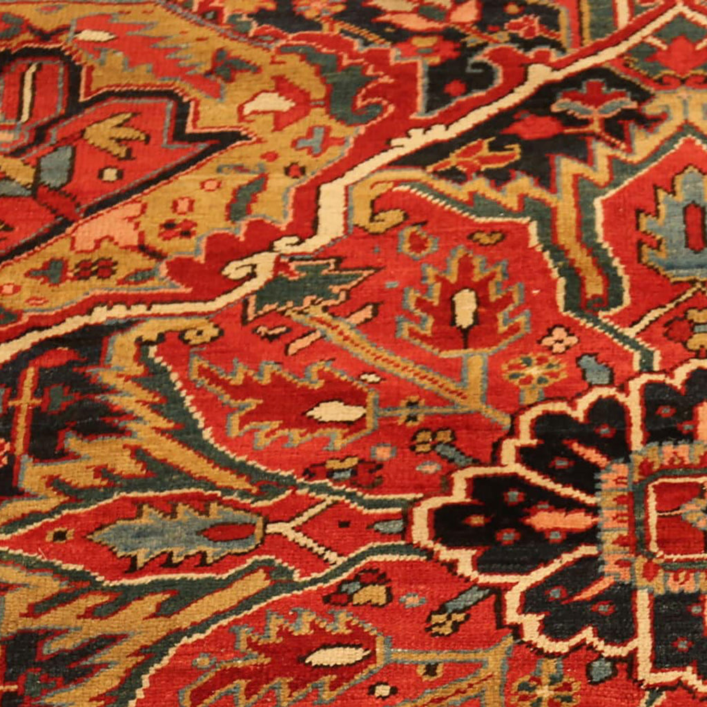 Close-up of a vibrant, detailed Persian rug with intricate patterns.