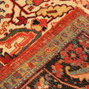 Close-up of intricately patterned hand-woven carpet showcases vibrant colors.