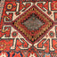 Exquisite hand-woven oriental rug showcasing intricate geometric patterns and motifs.