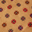 Symmetric floral design with warm tones on a flat carpet.