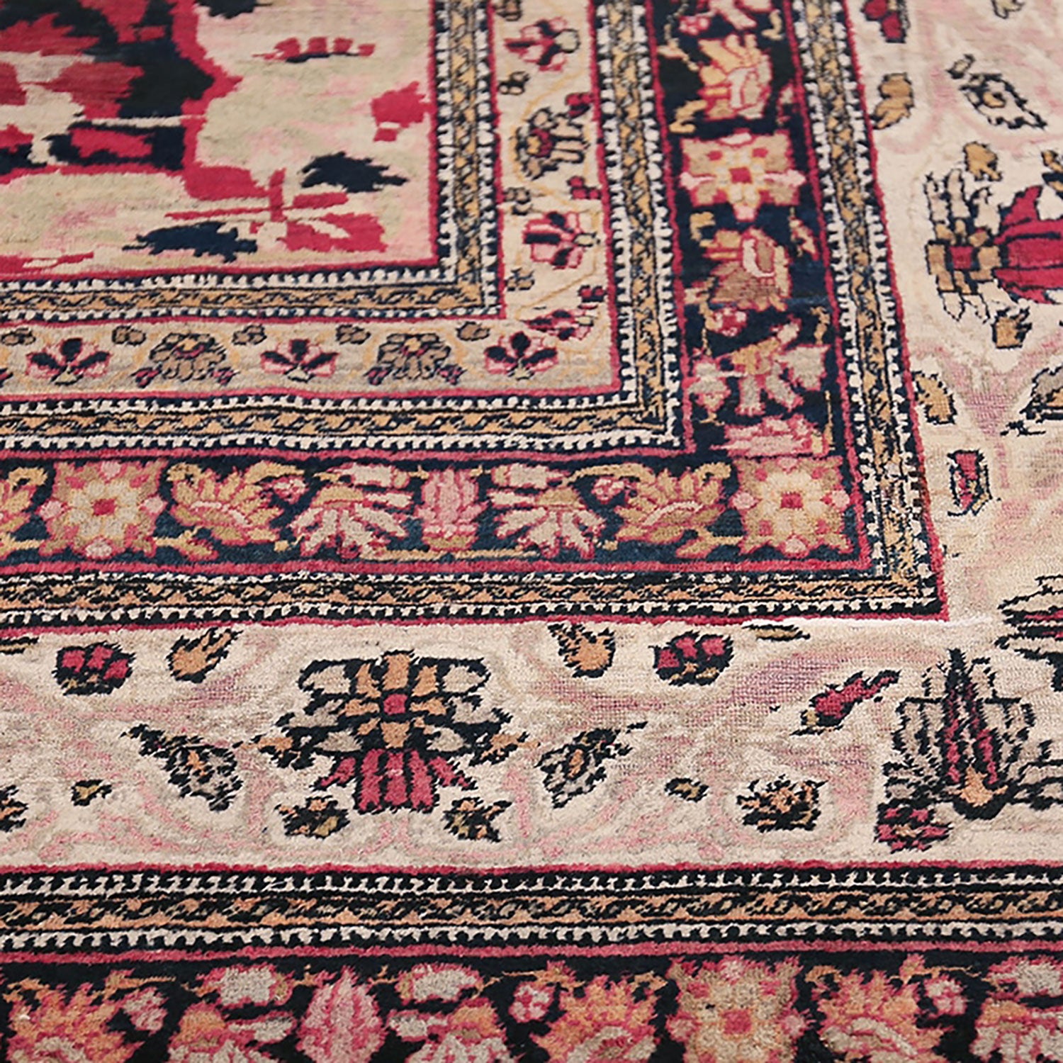 Exquisite handmade rug with intricate floral and geometric motifs