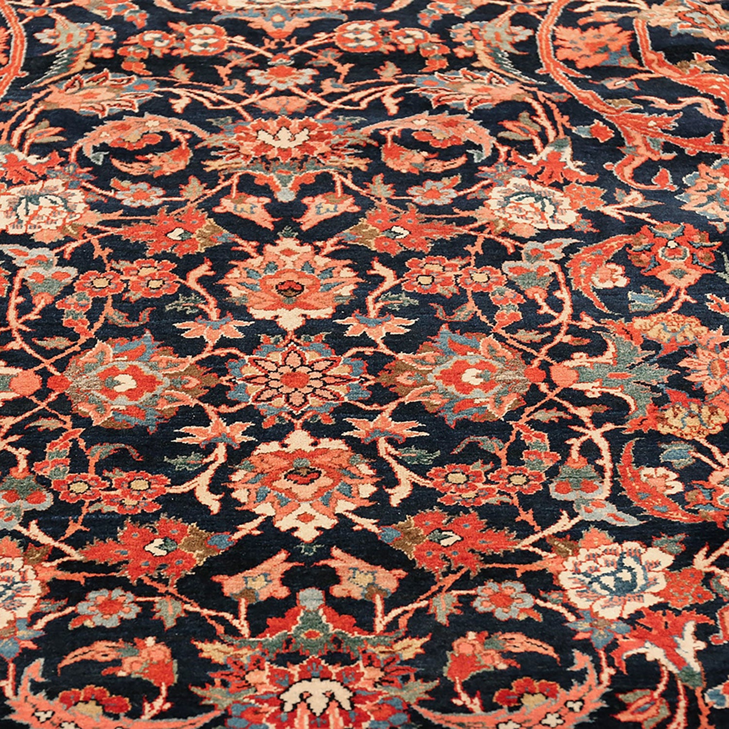 Close-up view of a hand-crafted, Persian-style rug with intricate designs.