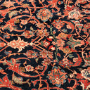 Close-up of a traditional handmade floral carpet with vibrant colors.