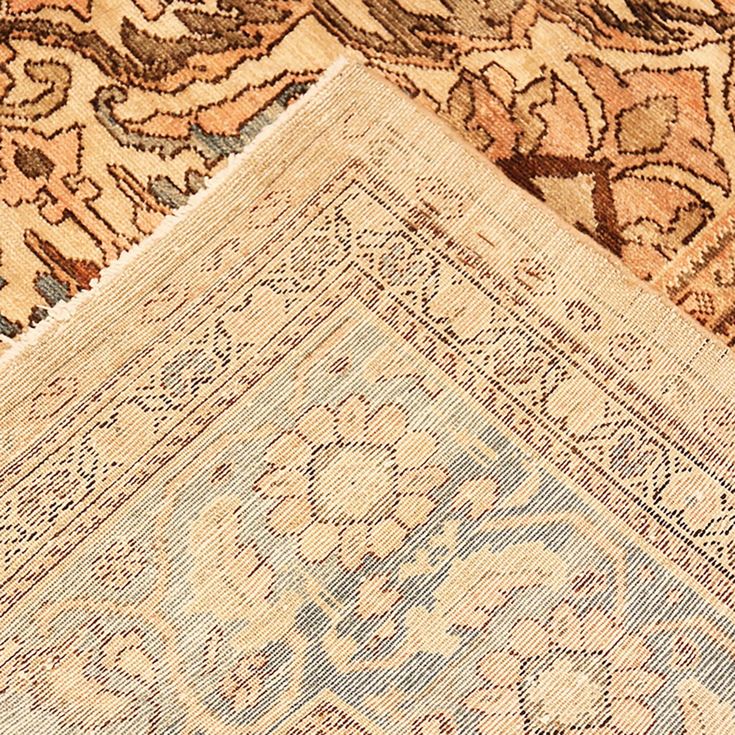 Close-up view of a traditional woven rug showcasing intricate patterns.
