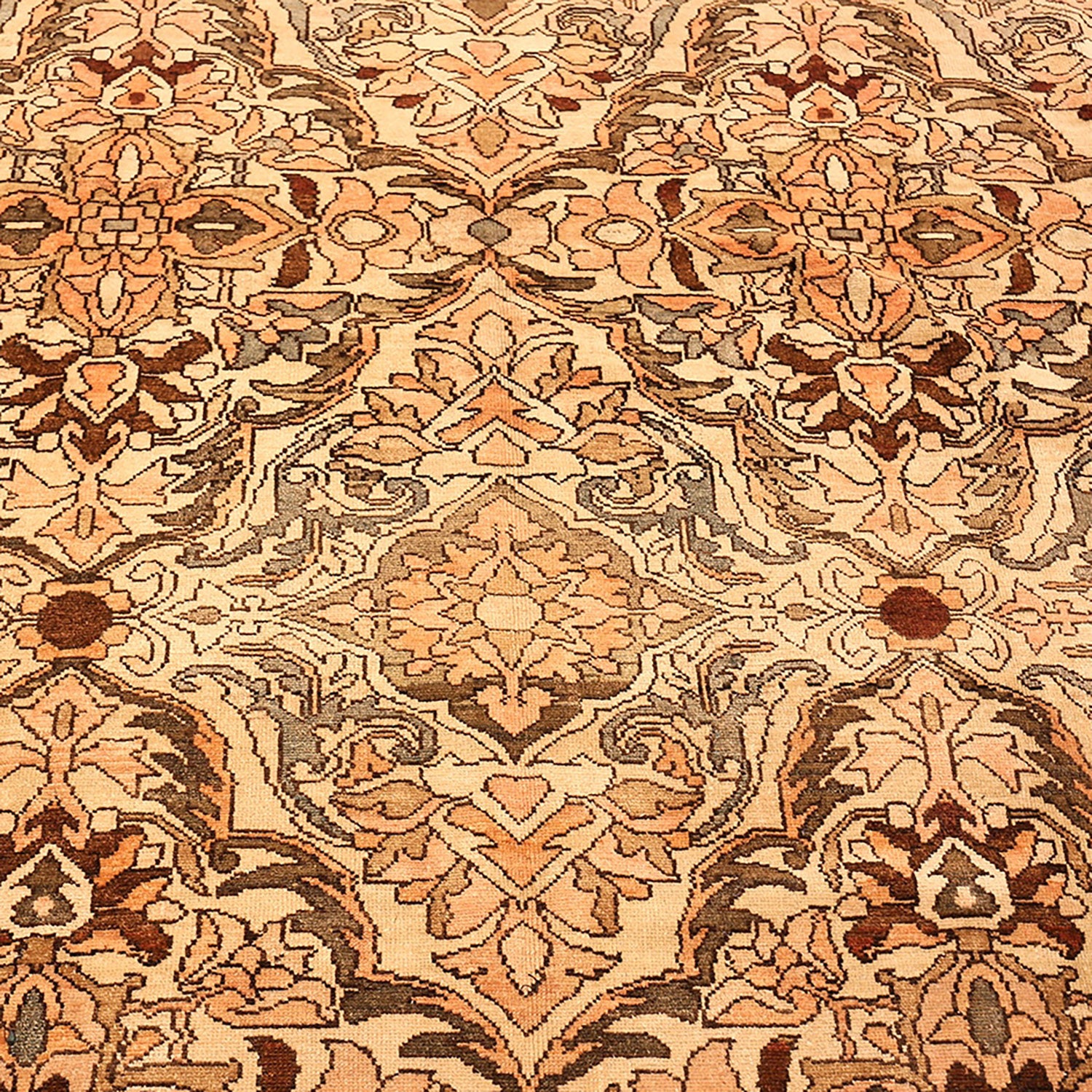 Exquisite carpet showcases a symmetrical blend of floral and geometric patterns