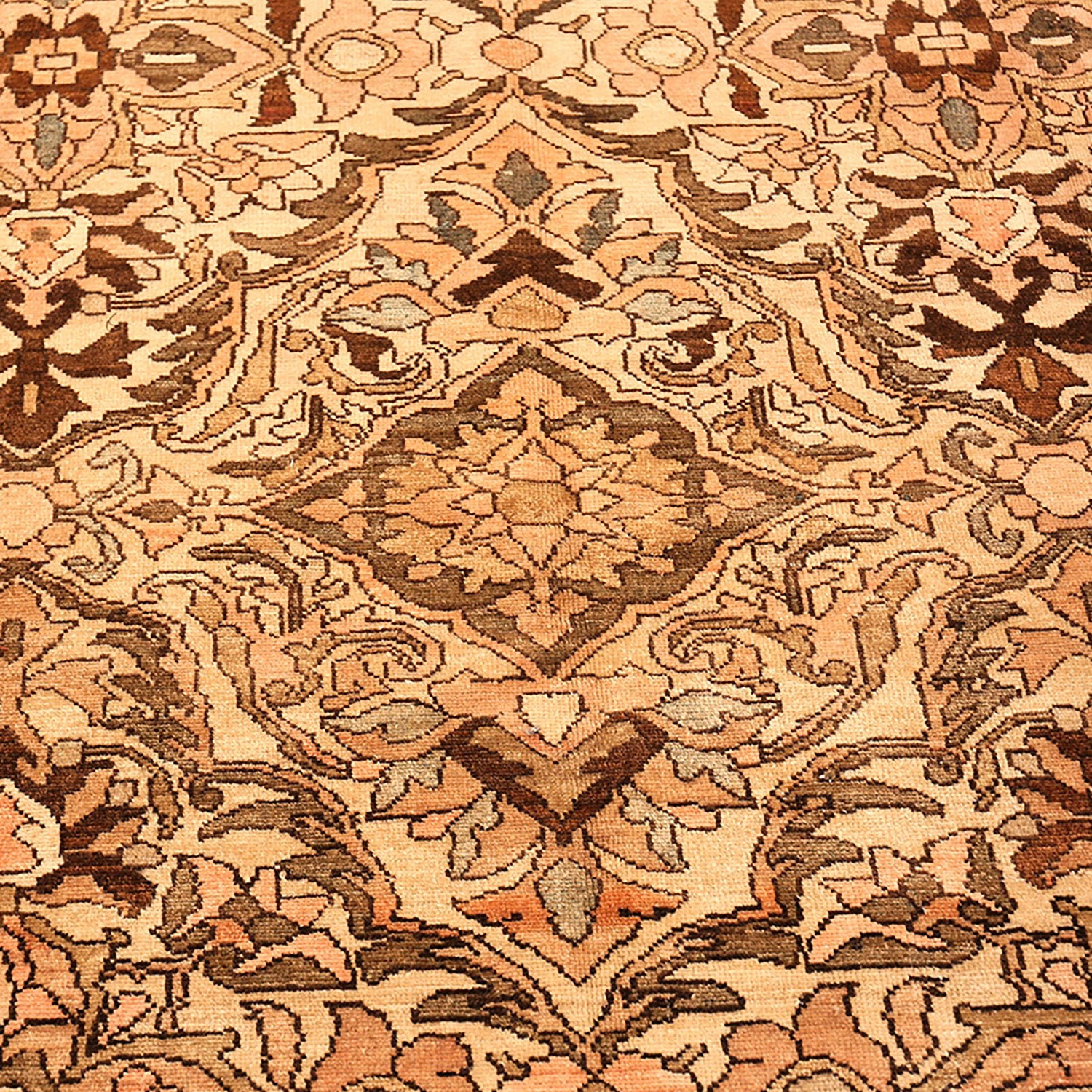 Close-up of an ornate Persian-inspired carpet with intricate symmetrical design.