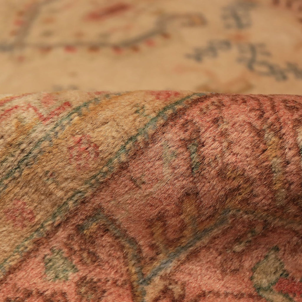 Close-up of textured fabric with detailed pattern, creating 3D effect.