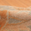 Close-up of textured fabric, showcasing softness and intricate patterns.