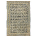 Intricately designed traditional rug with floral motifs and geometric shapes.