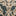 Close-up view of a traditional patterned carpet with floral motifs.