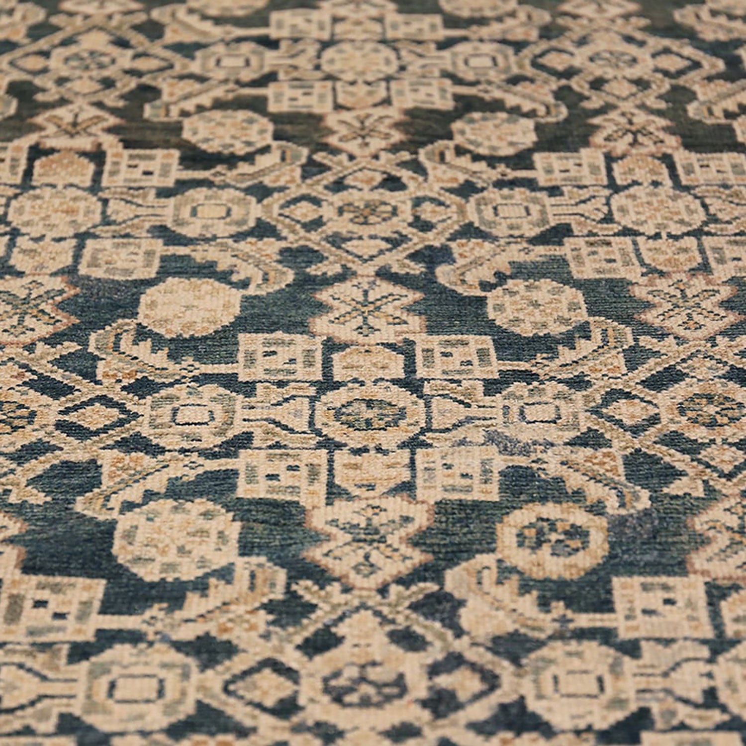 Intricate geometric patterns adorn a quality woven area rug.