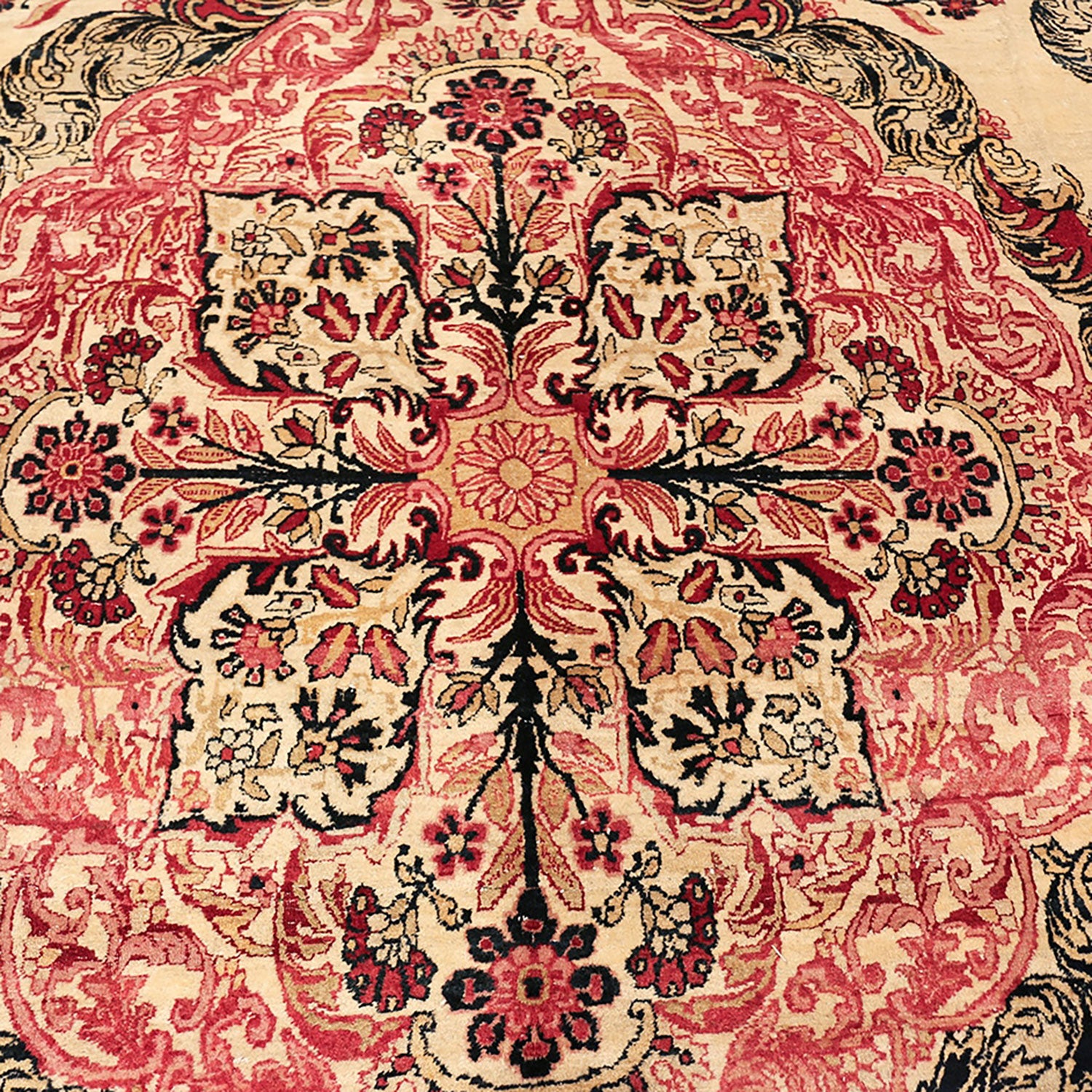 Exquisite handcrafted rug showcasing intricate floral motifs in warm tones.