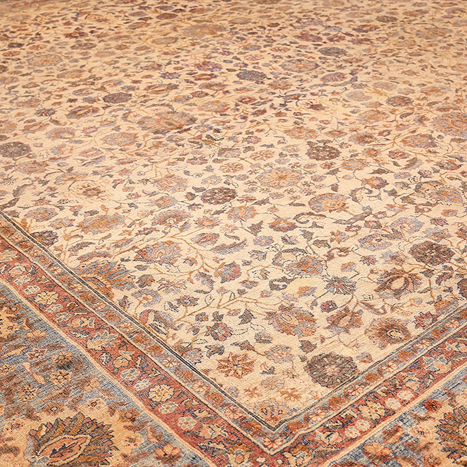 Close-up of a vibrant, handwoven floral patterned carpet brings comfort.