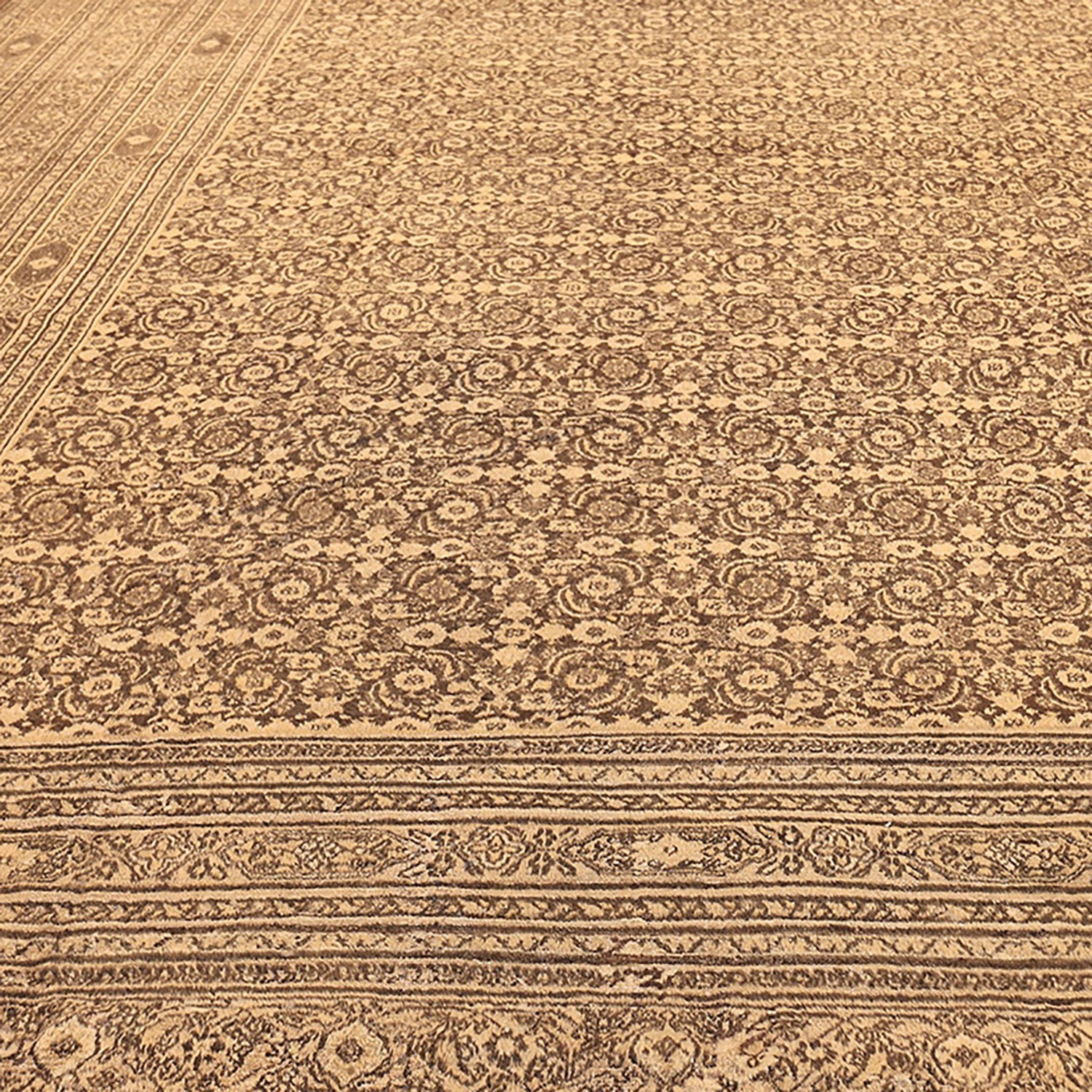 Exquisite traditional carpet with intricate floral and geometric patterns.