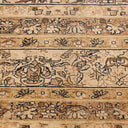 Intricately woven classical carpet with floral motifs and geometric shapes.