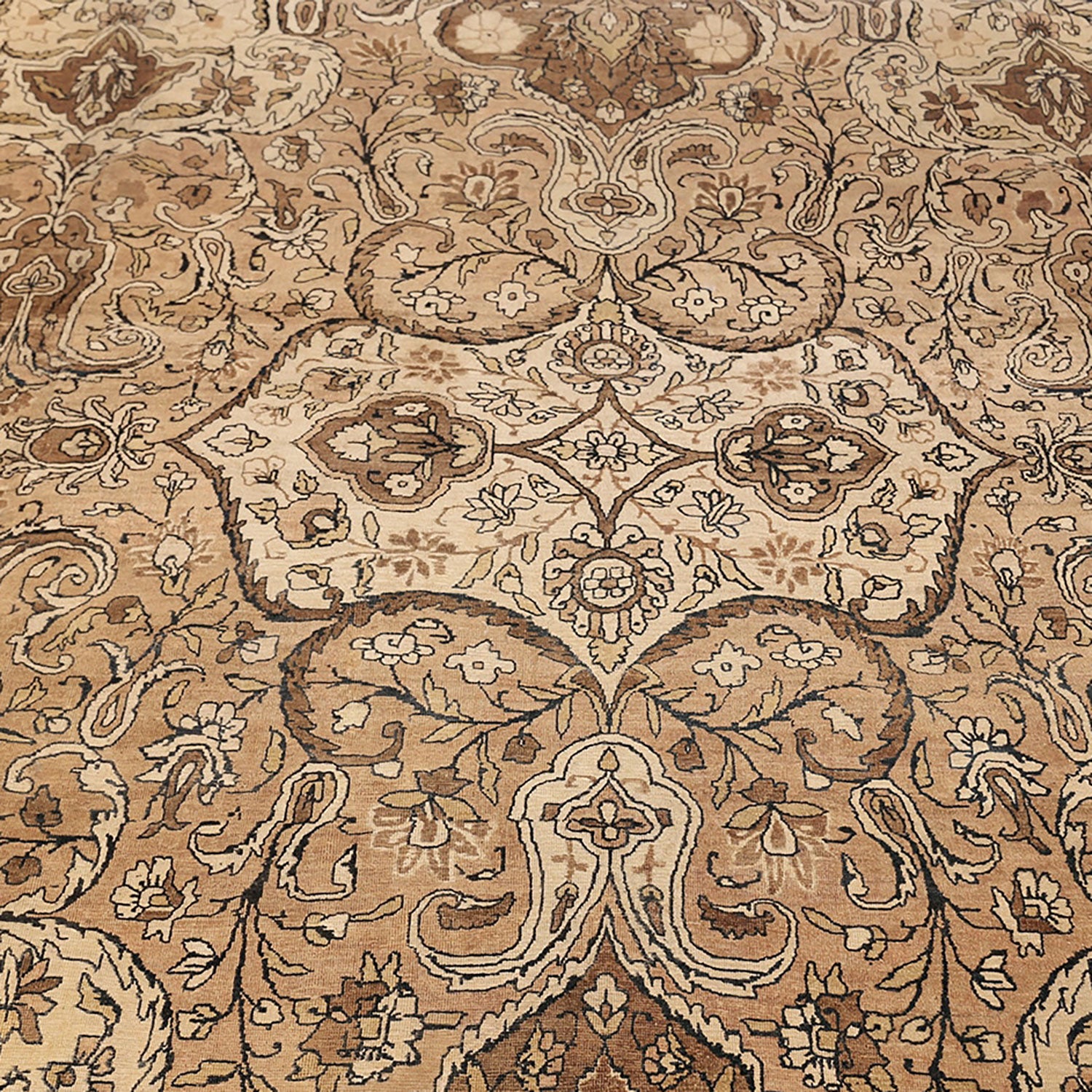 Exquisite, symmetrical floral motifs adorn a luxurious Persian-style carpet.