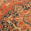 Close-up of a handcrafted traditional carpet with intricate patterns.