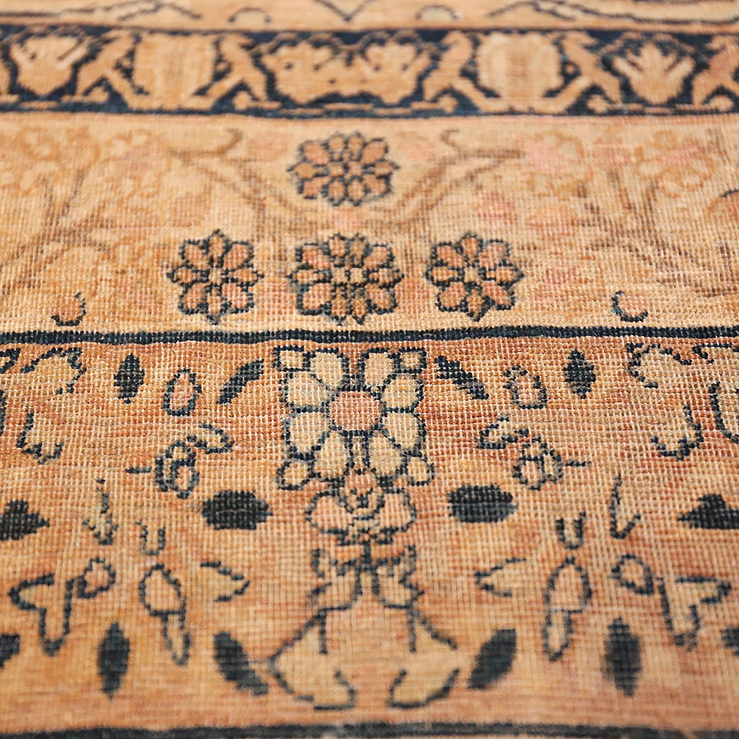 Intricate traditional rug with floral motifs and Persian/Oriental influences.