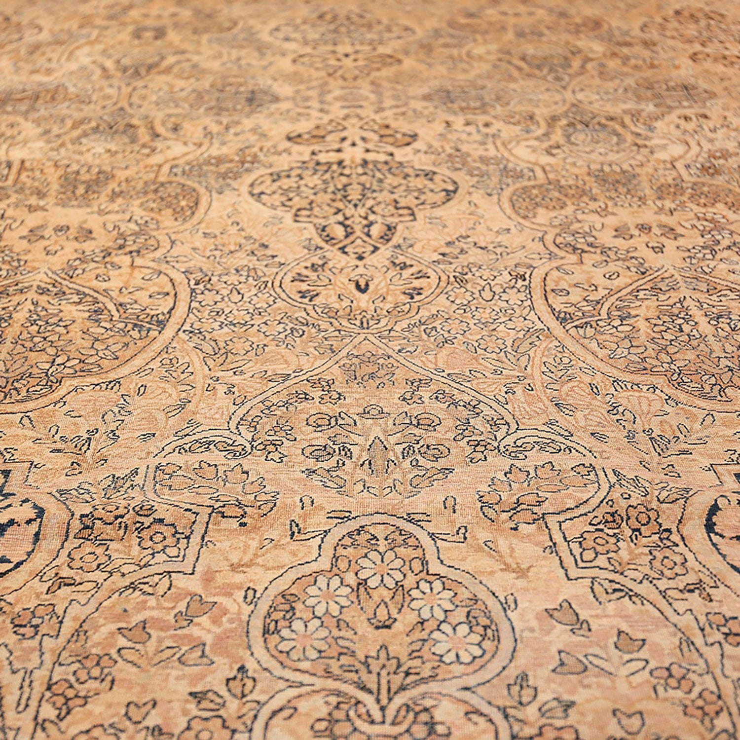 Exquisite handcrafted rug with intricate botanical motifs and warm tones