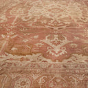 Exquisite traditional carpet adorned with floral and geometric motifs.