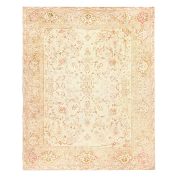 Rectangular Persian/Oriental rug with an ornate floral design and delicate color palette.