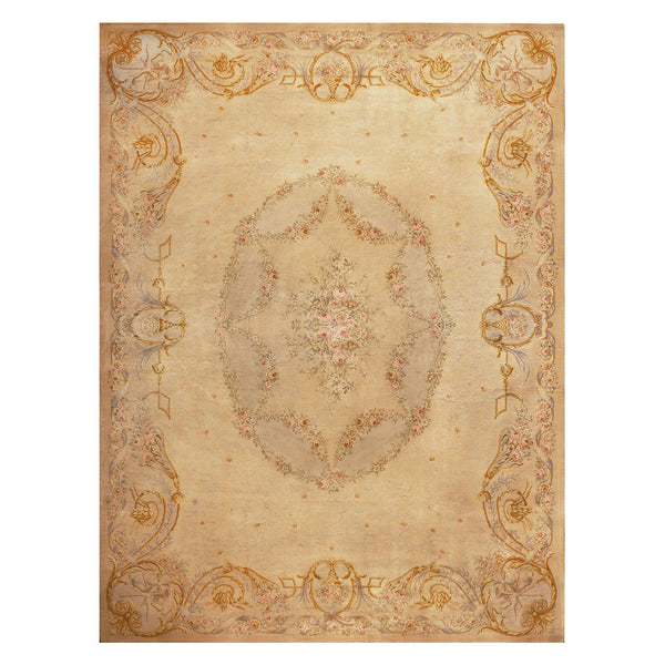 Exquisite ornate rug with floral motifs in shades of pink.