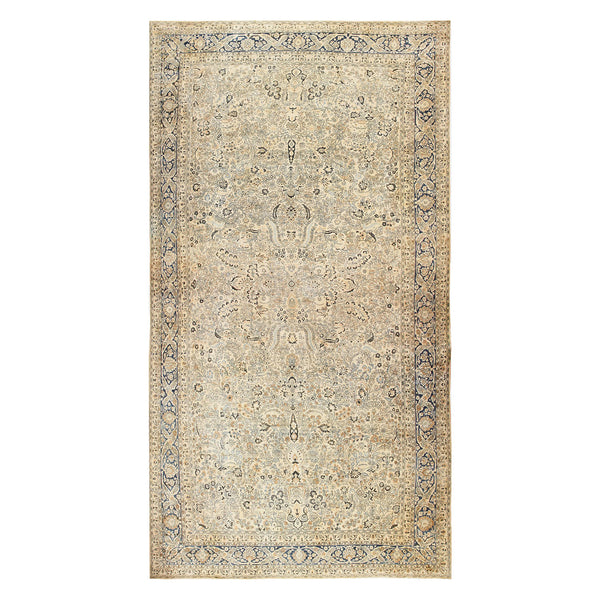 Elegant ornate area rug with symmetrical design in muted tones.