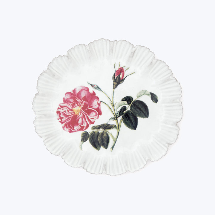Decorative plate with elegant red rose floral design on white background.