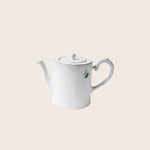 Classic white ceramic teapot with green plant figure decoration design