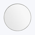 Minimalistic circular shape with dark outline on light background.