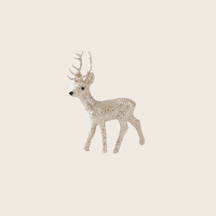 Glittery reindeer figurine for festive holiday decorations, sparkly and ornate.