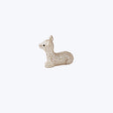 Gold glitter-covered fawn figure with simple silhouette profile view.