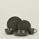 Elegant dark olive dinnerware set with textured circular ridges.